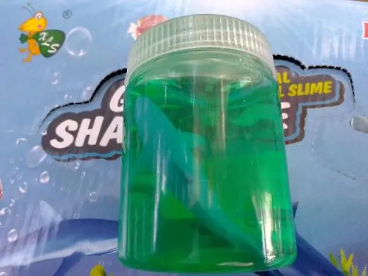 Igračka ljigavac green shark tale